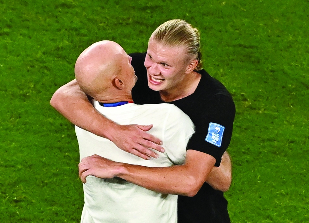  
Norway coach Stale Solbakken and Erling Haaland. — Reuters  