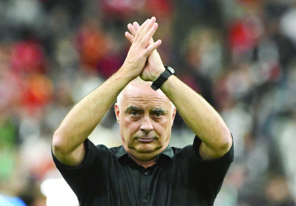  
New Zealand coach Darren Bazeley applauds fans after the match. — Reuters 