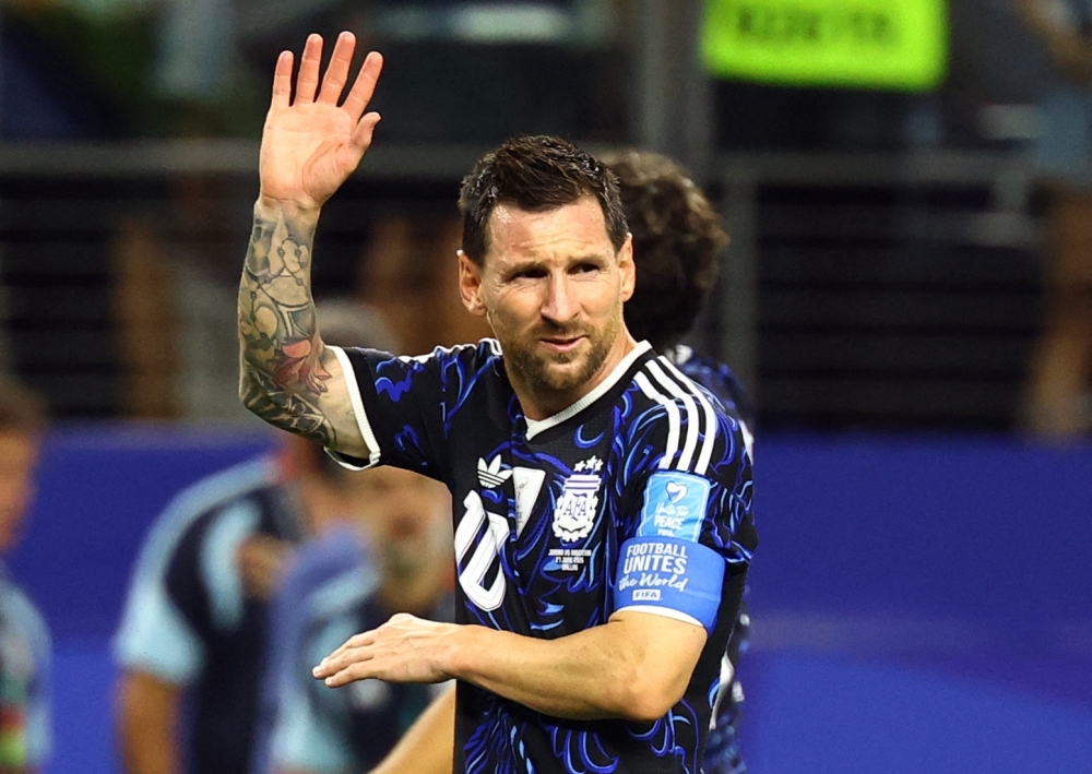  
Argentina's Messi celebrates after the match. — Reuters