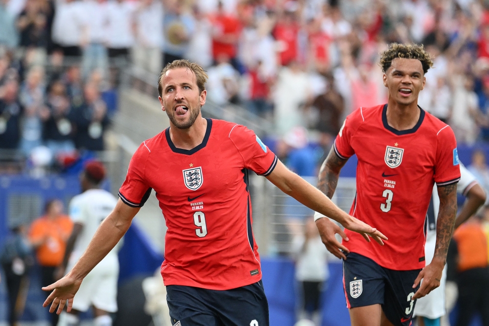 England's #09 Kane celebrates scoring second goal. — AFP  