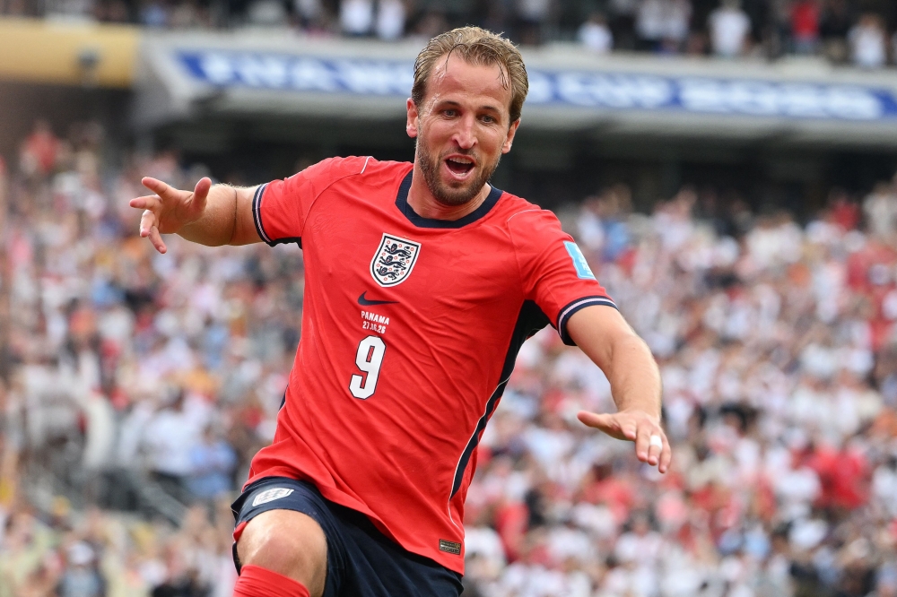 England's #09 Kane celebrates scoring second goal. — AFP 