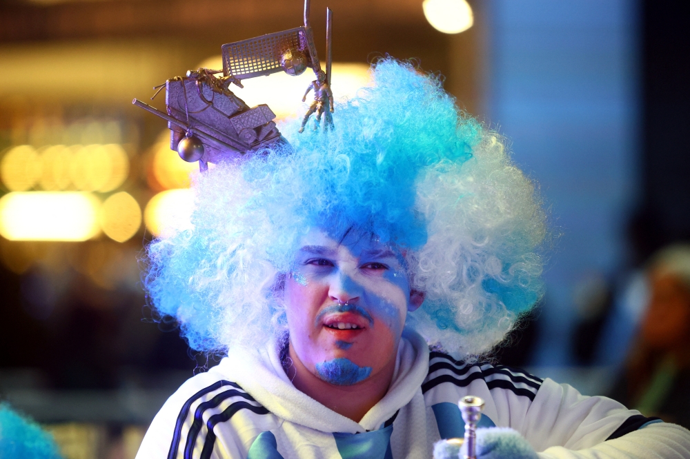  
An Argentina fan watches the match  