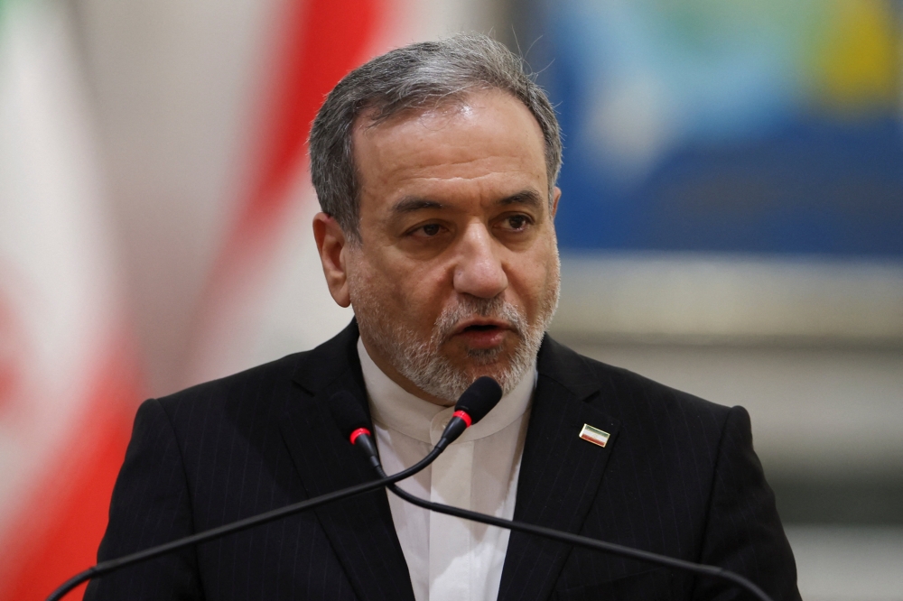 Iranian Foreign Minister Abbas Araqchi attends a press conference alongside Iraqi Foreign Minister Fuad Hussein (not pictured), in Baghdad, Iraq, June 28, 2026. 