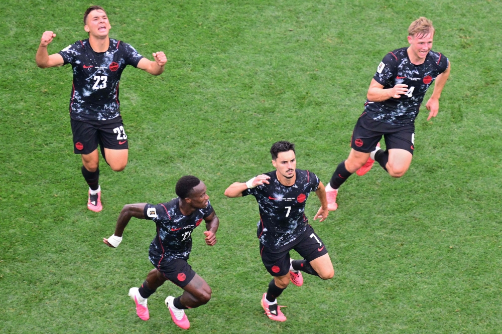 Canada's #07 Eustaquio celebrates scoring first goal. — Reuters