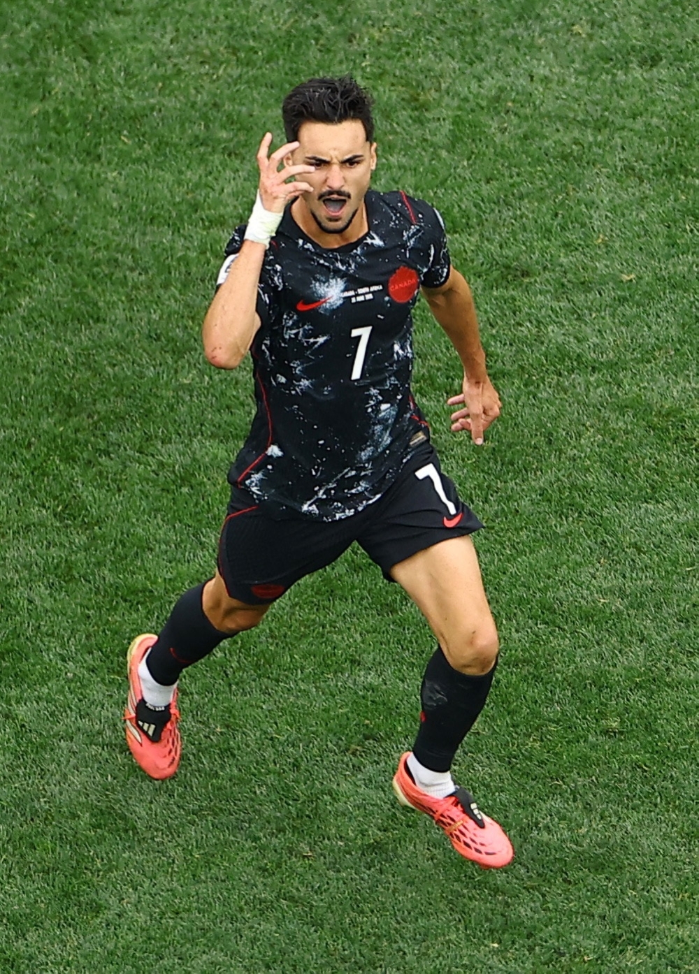  
Canada's Stephen Eustaquio celebrates scoring first goal. — Reuters