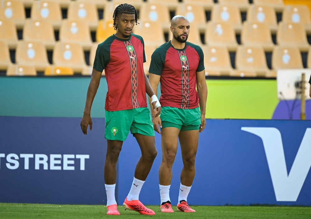 Morocco's #25 Halhal (L) and  #04 Amrabat. — AFP   