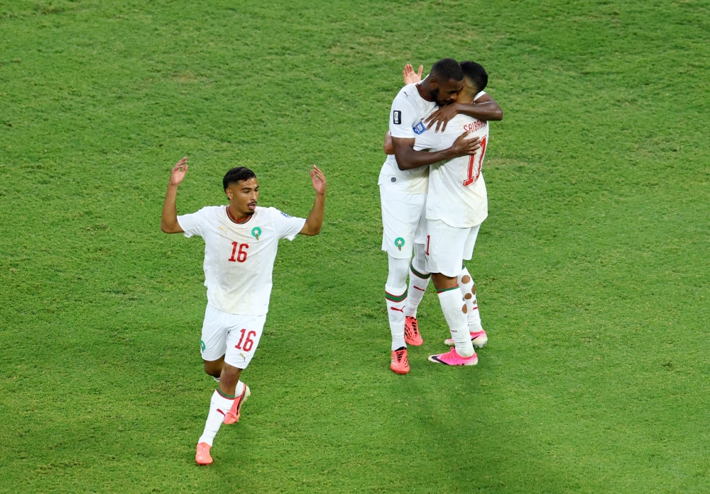 Morocco's celebrates first goal with Saibari and Yassine. — Reuters