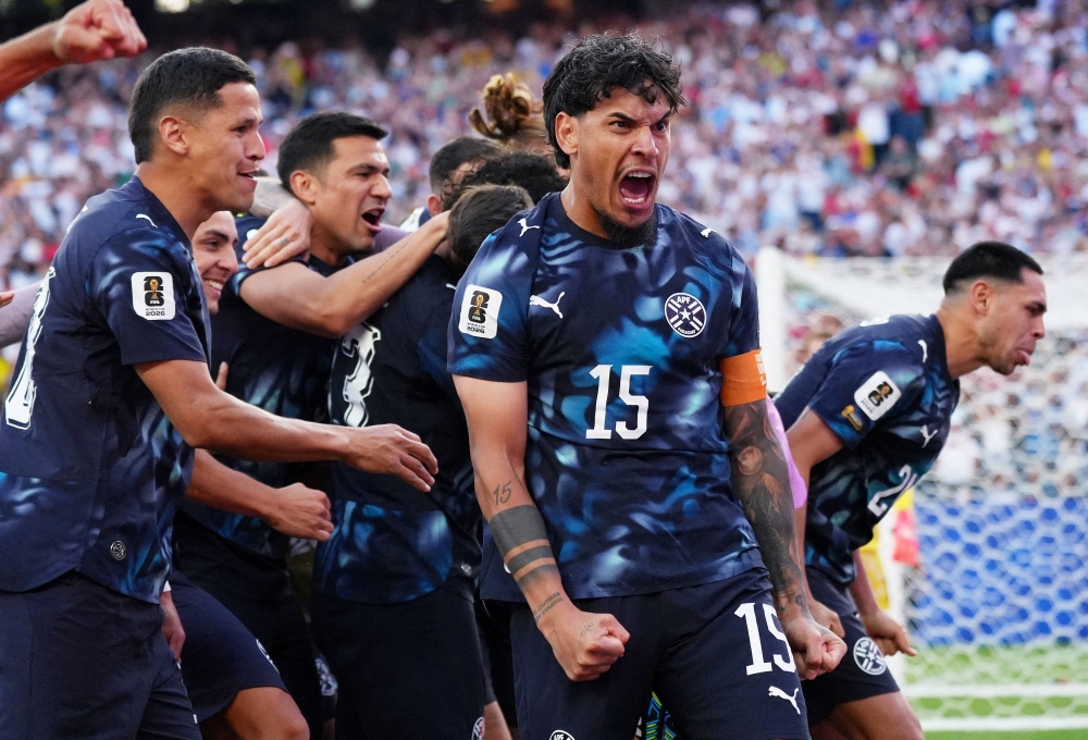  
Paraguay's Gustavo Gomez and teammates celebrate 