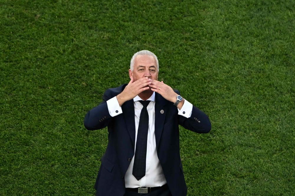 Paraguay's head coach Alfaro celebrates the winning. — AFP 