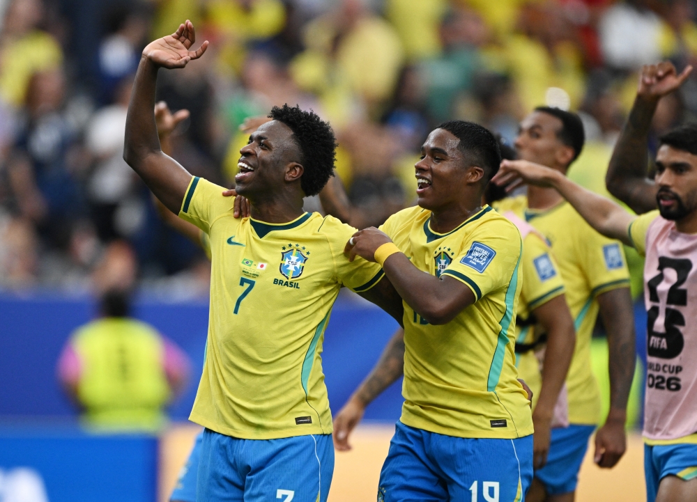  
Brazil's Vinicius and Endrick celebrate after the match. — Reuters 