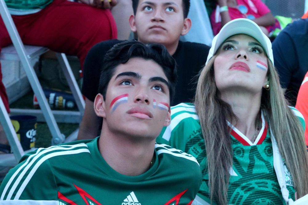 Mexican football fans gather at the FIFA Fan Fest to watch a live broadcast of the 2026 FIFA World Cup football match between the Netherlands and Morocco at Parque Fundidora in Monterrey 