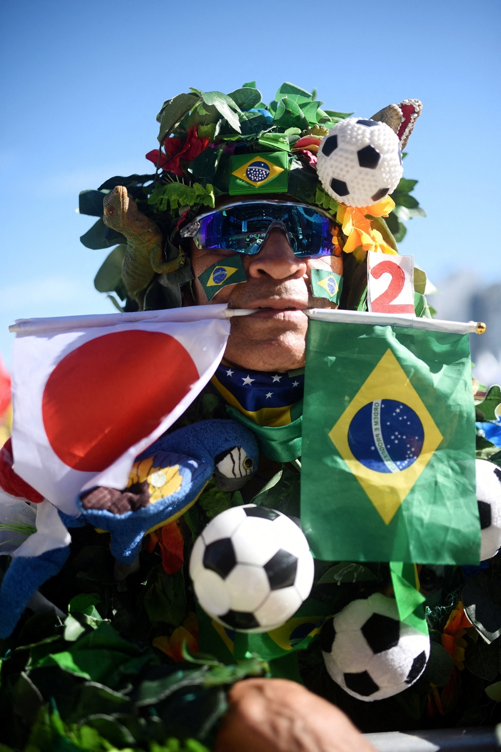  
A Brazil fan wears a costume at the fan zone  