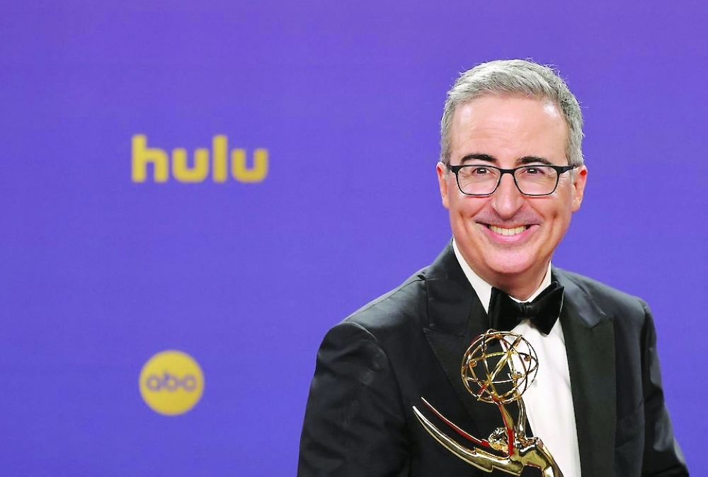 John Oliver poses with the Outstanding Scripted Variety Series award at the 76th Primetime Emmy Awards. — Reuters