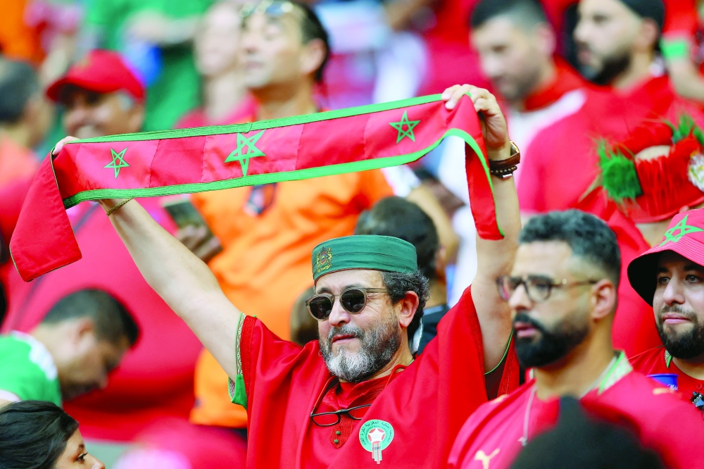 Morocco fans inside the stadium before the match. — Reuters