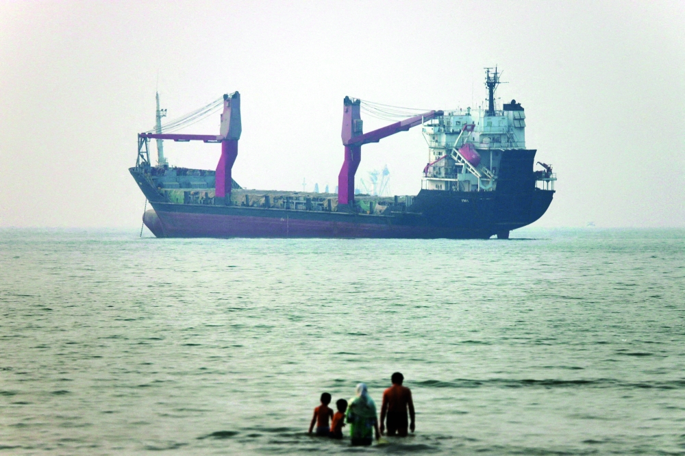 A vessel in the Strait of Hormuz near the beach of Bandar Abbas, Iran, on Tuesday. — Reuters