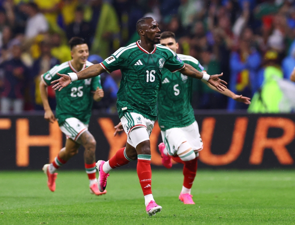  
Mexico's Quinones celebrates scoring first goal. — Reuters