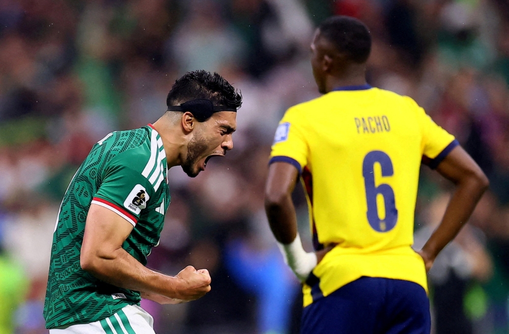  
Mexico's Jimenez celebrates scoring second goal. — Reuters
 