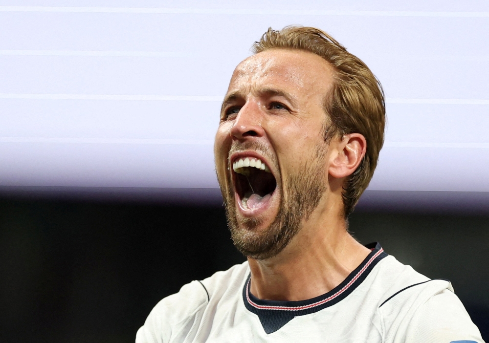  England's #09 Harry Kane celebrates after the winning. — AFP  