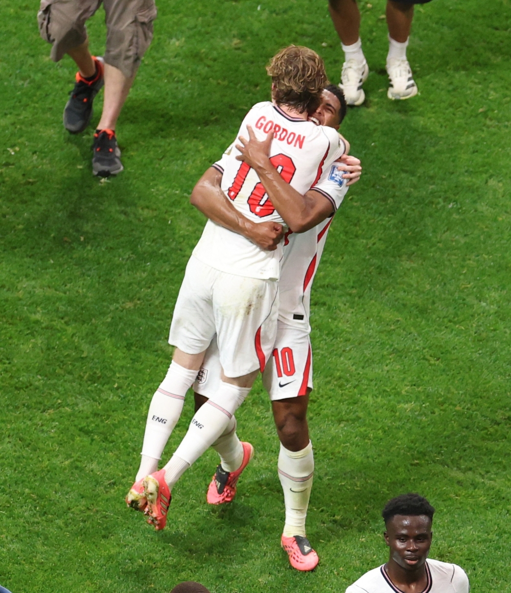  
England's Gordon and Bellingham celebrate after the match. — Reuters  