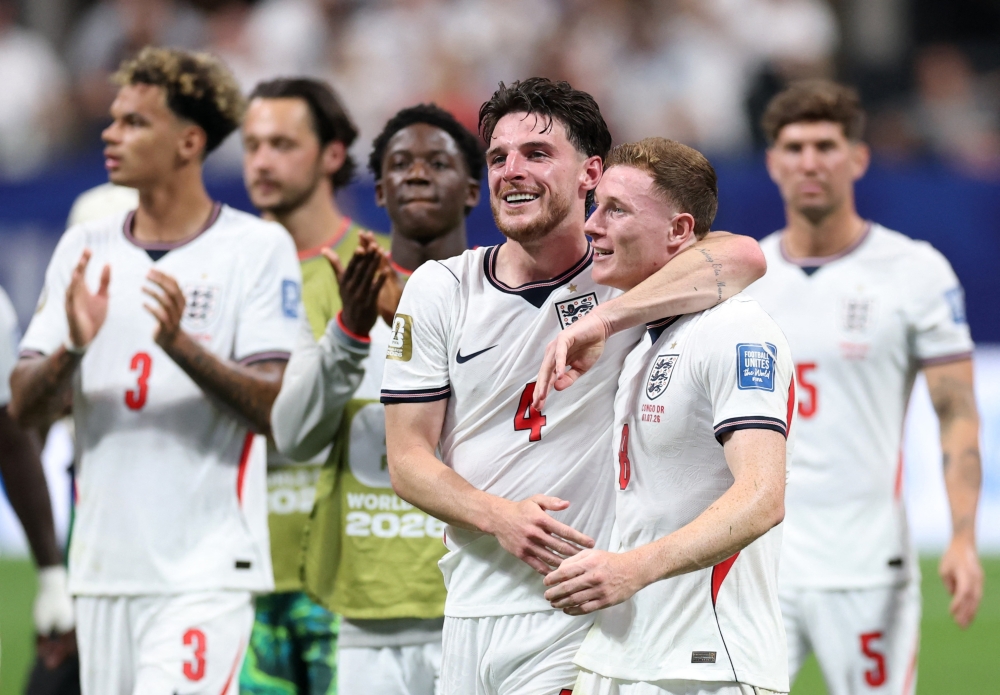  
England's Declan Rice and Elliot Anderson celebrate after the match. — Reuters   