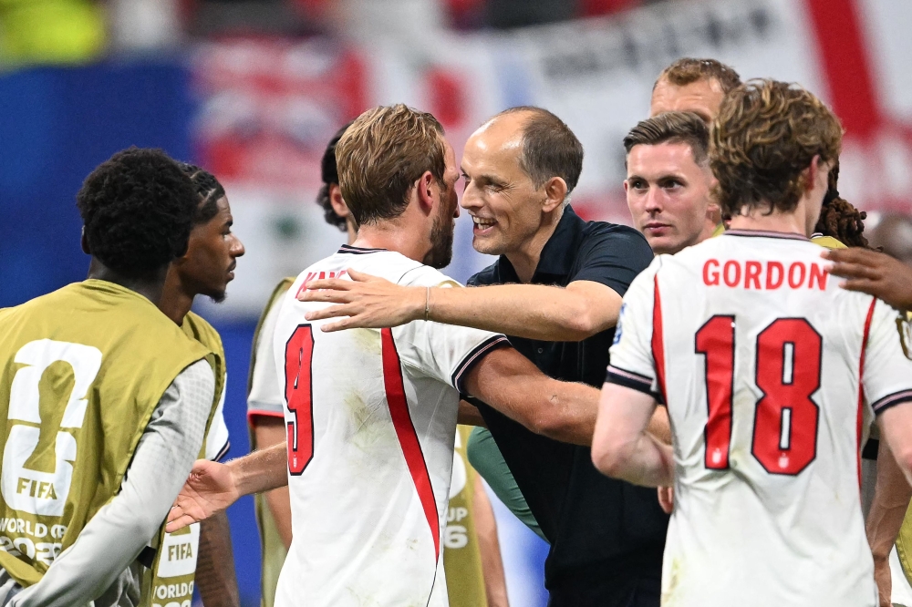 England's #09 Kane and England's head coach Tuchel . — AFP