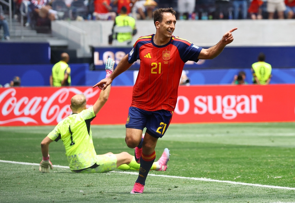  
Spain's Oyarzabal celebrates third goal. — Reuters 
