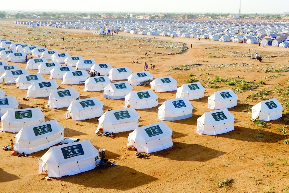 Tents display the logo of Saudi Arabia at a displaced persons camp in El Obeid, North Kordofan State, Sudan. - Reuters File