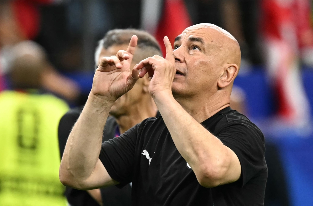 Egypt's head coach Hossam celebrates the winning. — AFP
