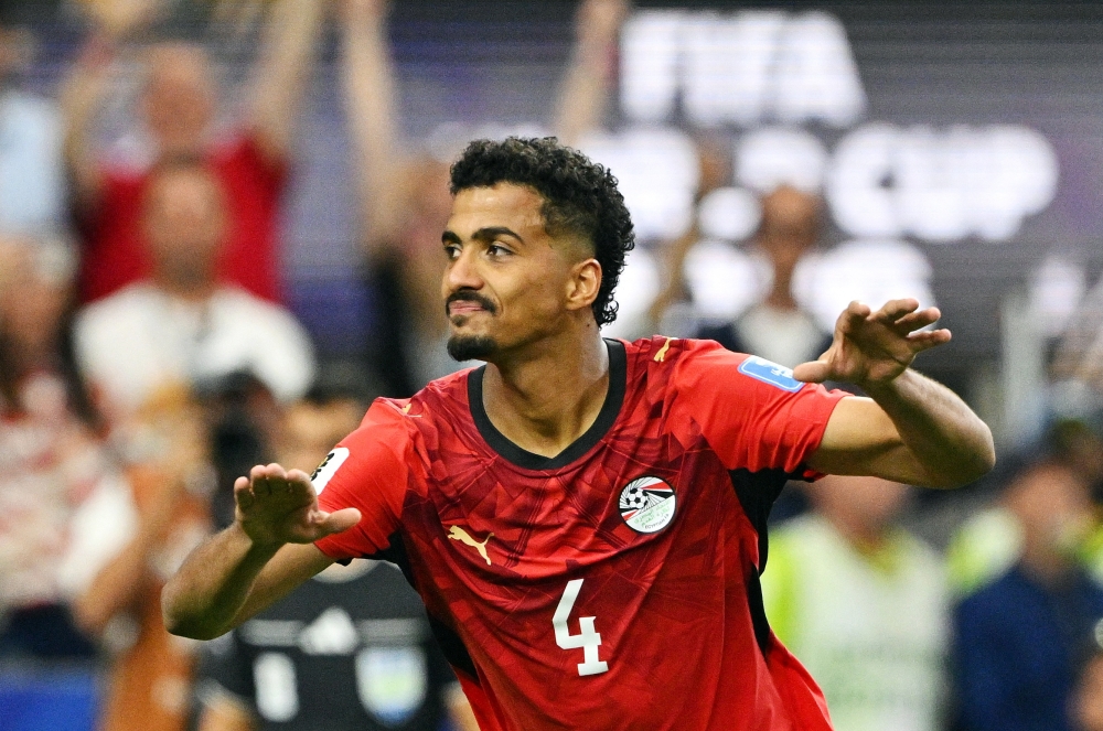  
Egypt's Abdelmaguid celebrates scoring a penalty. — Reuters  