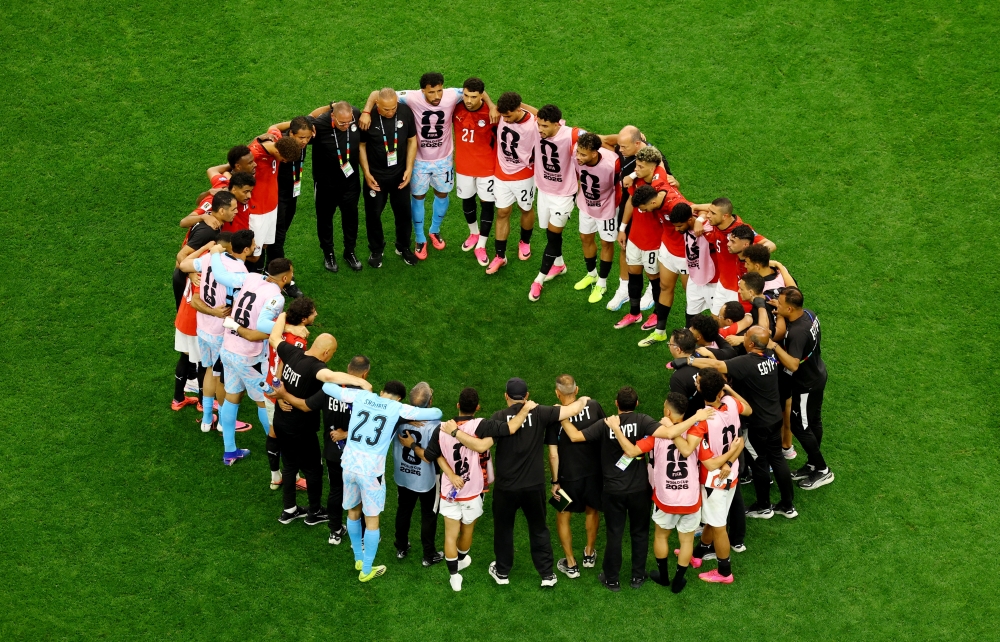  
Egypt squad ahead of the penalty shootout. — Reuters