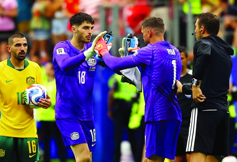  
Australia's Mathew Ryan comes on as a substitute to replace Patrick Beach. — Reuters