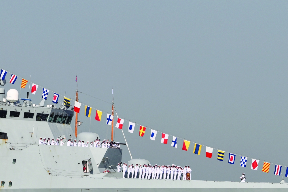 Sailors stand on board the Danish frigate HDMS Iver Huitfeldt (F361) ahead of the Sail4th 250 parade of ships in New York Harbor. — AFP