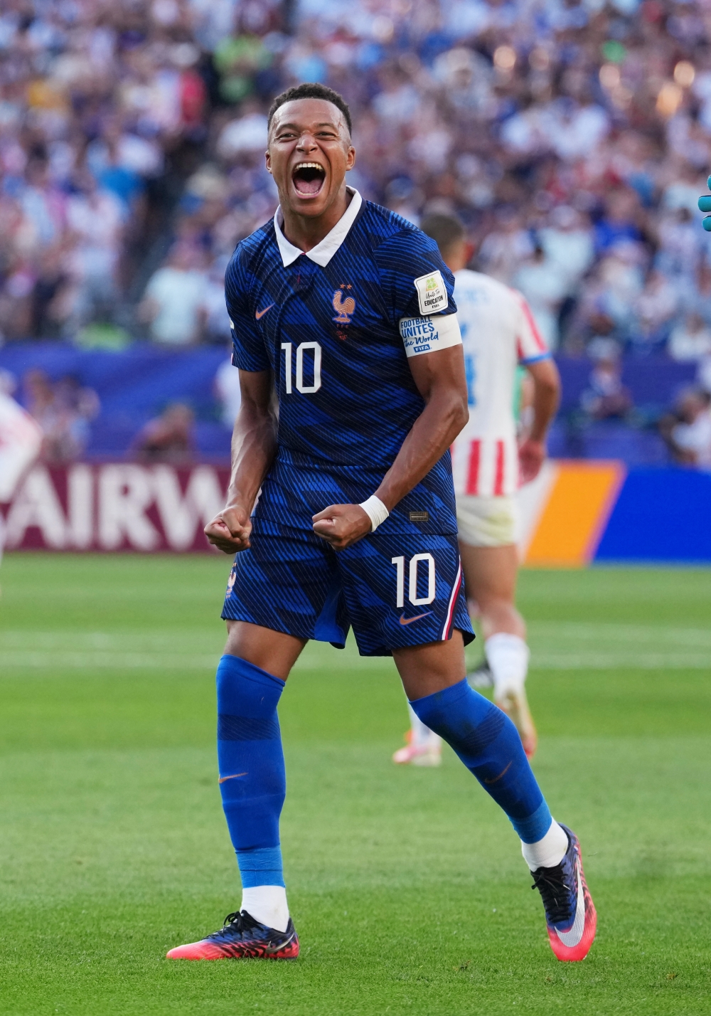  
France's Kylian Mbappe celebrates after the match 