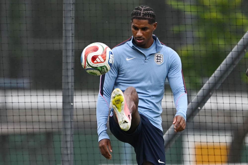 England's forward #11 Marcus Rashford takes part in a training session at the Pumas training grounds 