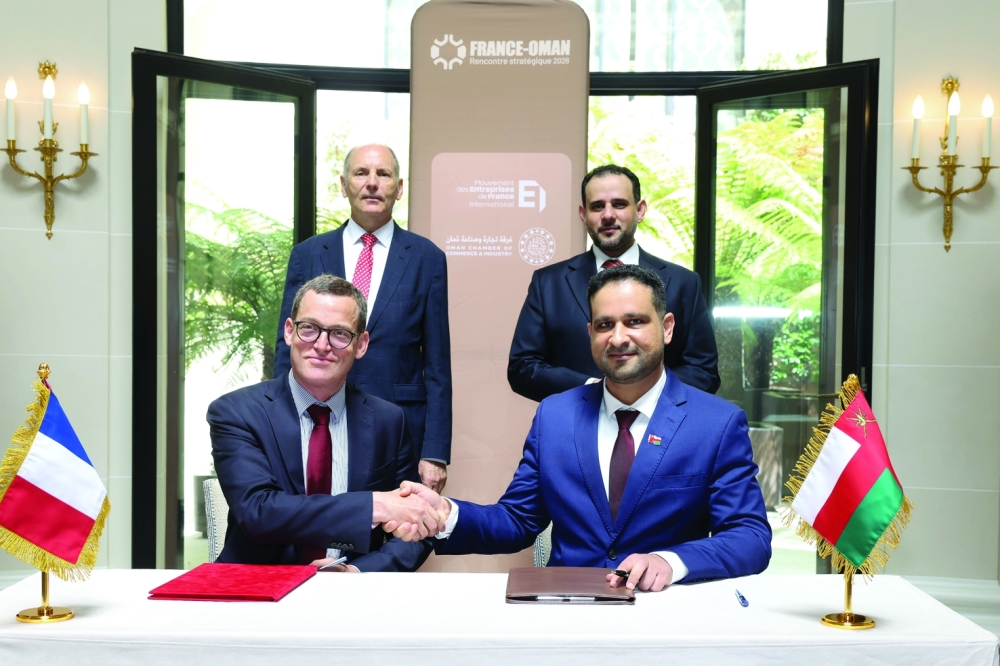 Officials signing the agreement in Paris recently.