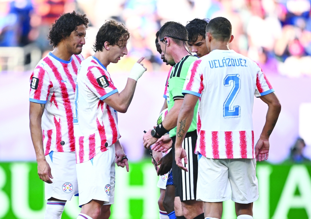  
Paraguay's Galarza protests France penalty decision. —  Reuters 