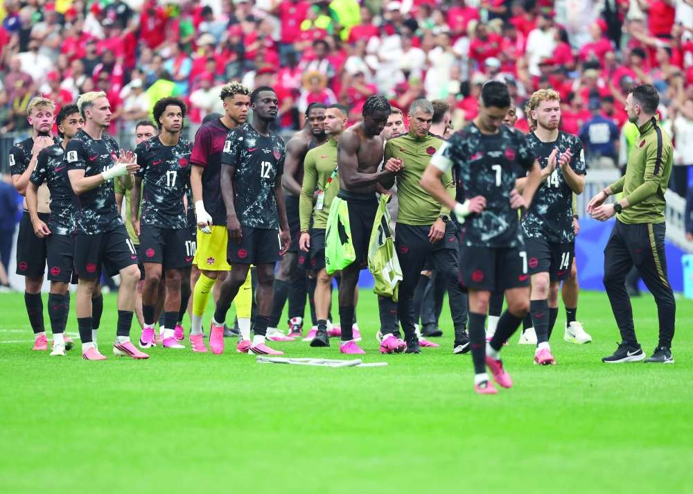 Canada's players react after losing. — AFP