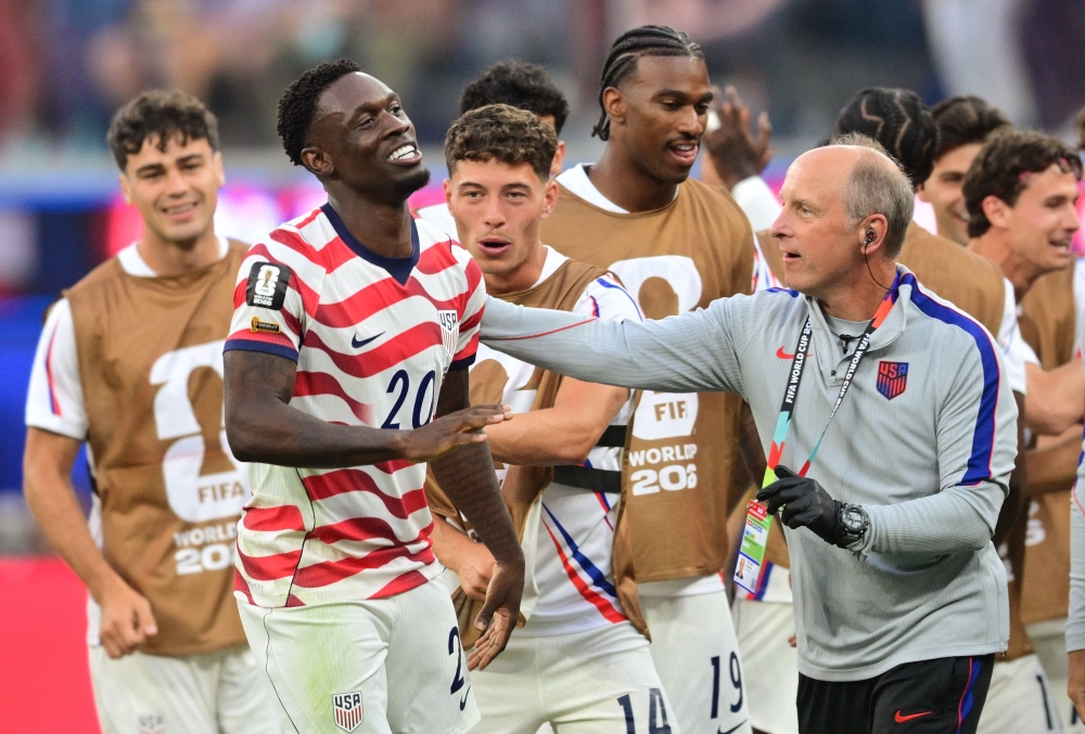 (FILES) US forward #20 Folarin Balogun celebrates scoring his team's second goal during the 2026 World Cup Group D football match between USA and Paraguay  