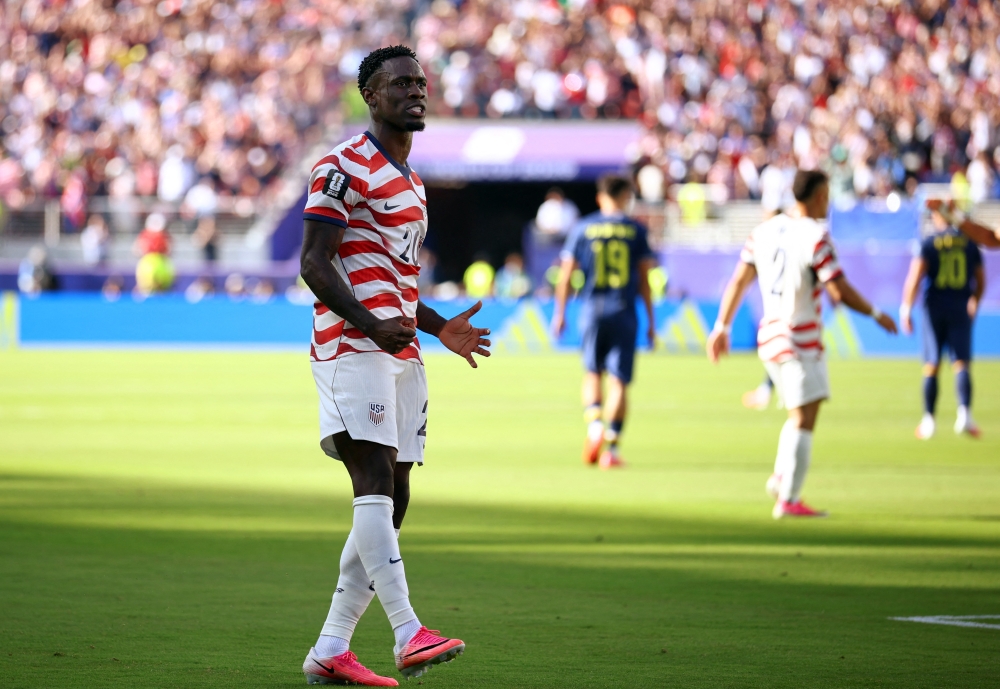  
Folarin Balogun of the U.S. celebrates scoring their first goal  