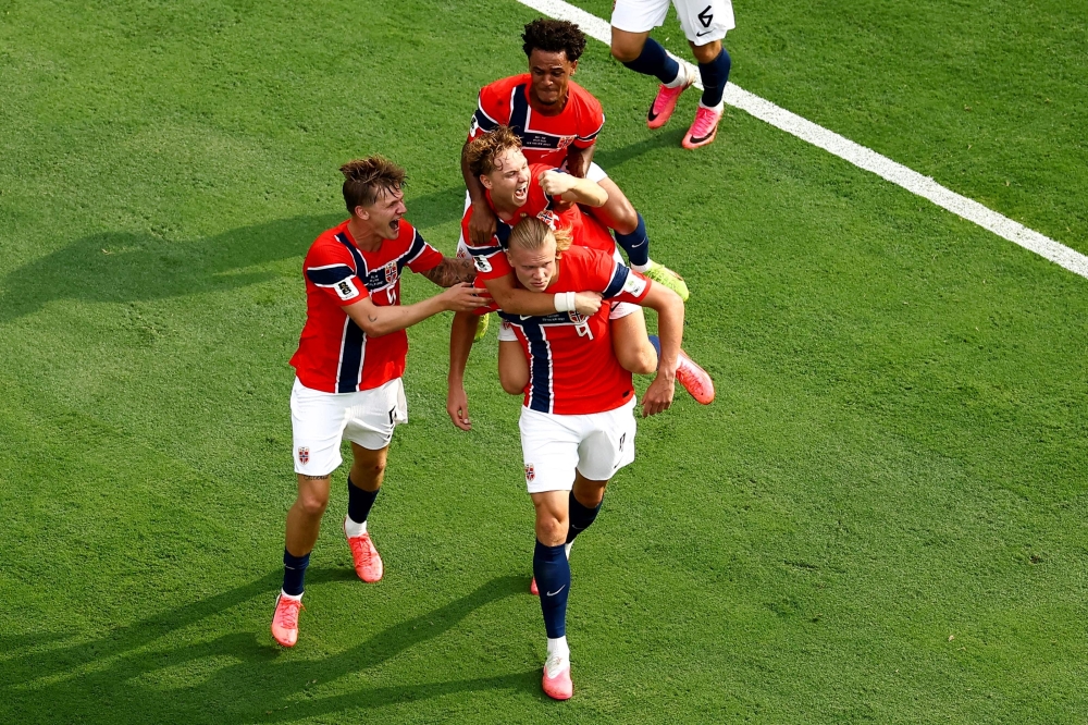 Norway's #09 Haaland celebrate with teammate. — AFP