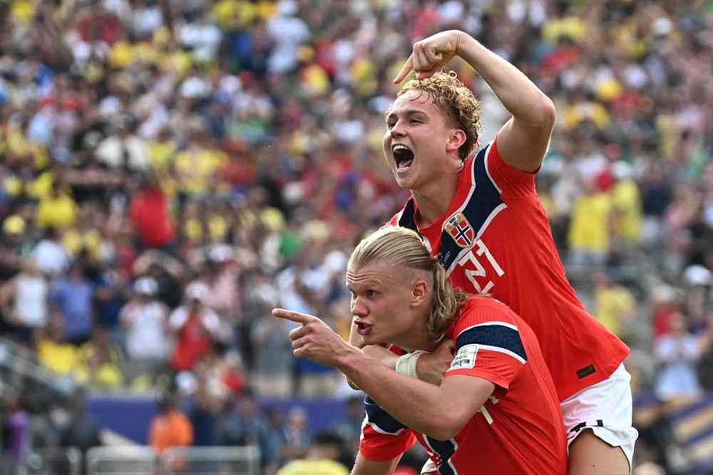 Norway's #09 Haaland (L) celebrates second goal with #21 Schjelderup. — AFP