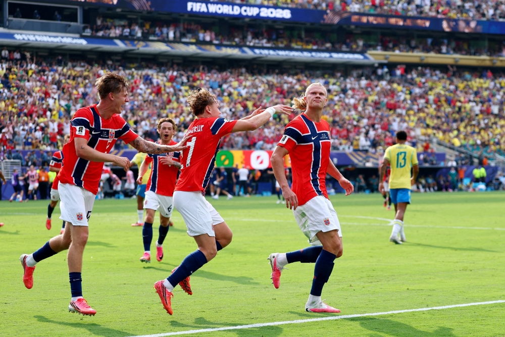  
Norway's Haaland celebrates first goal with Schjelderup and Moller. — Reuters