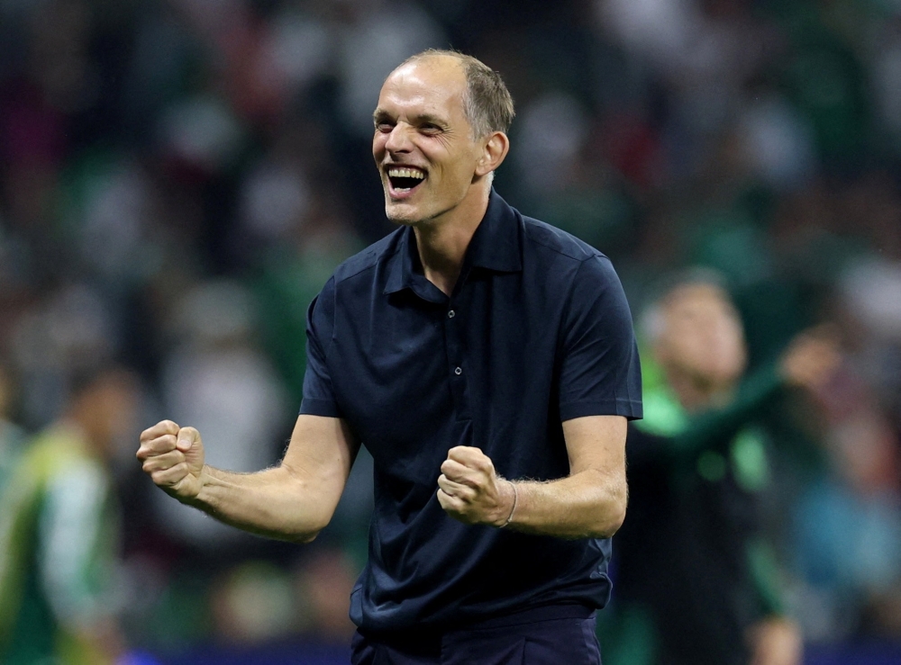  
England manager Thomas Tuchel celebrates after the match  
