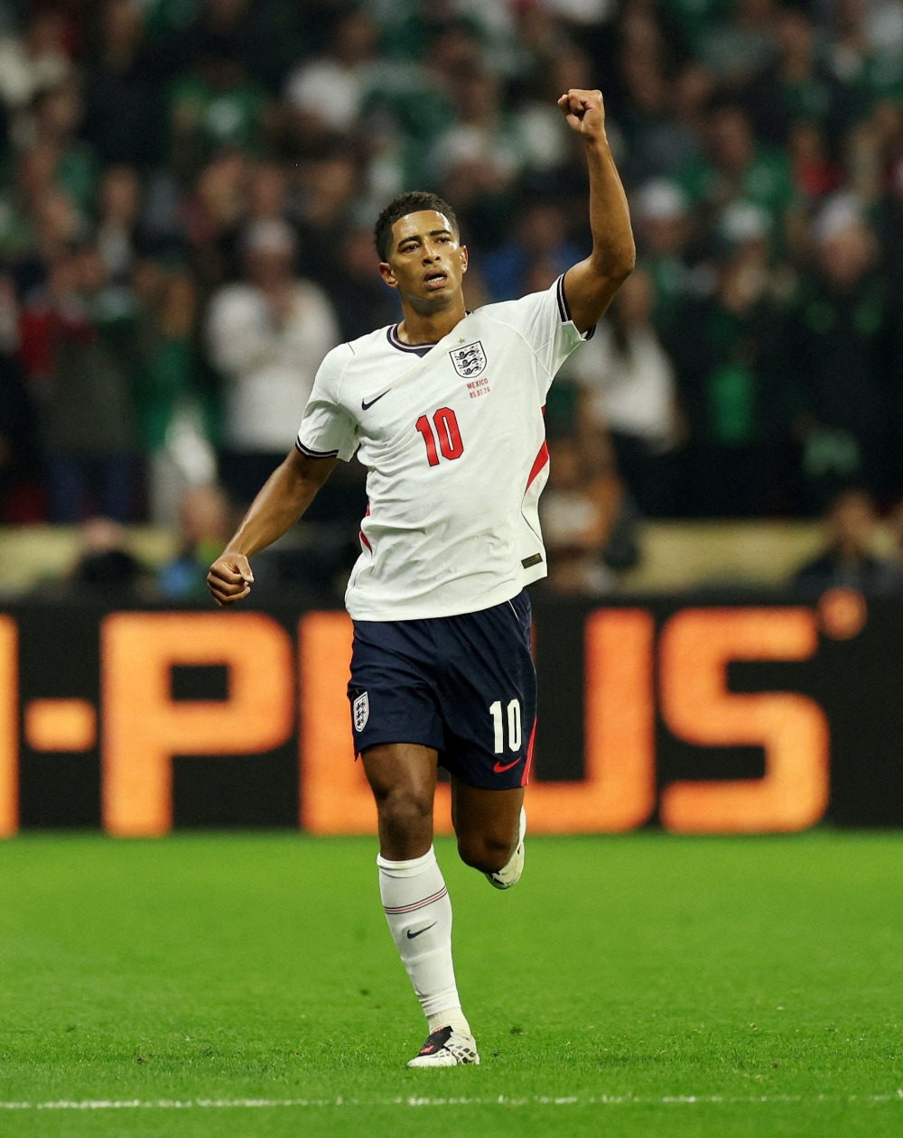  
England's Jude Bellingham celebrates scoring their first goal  