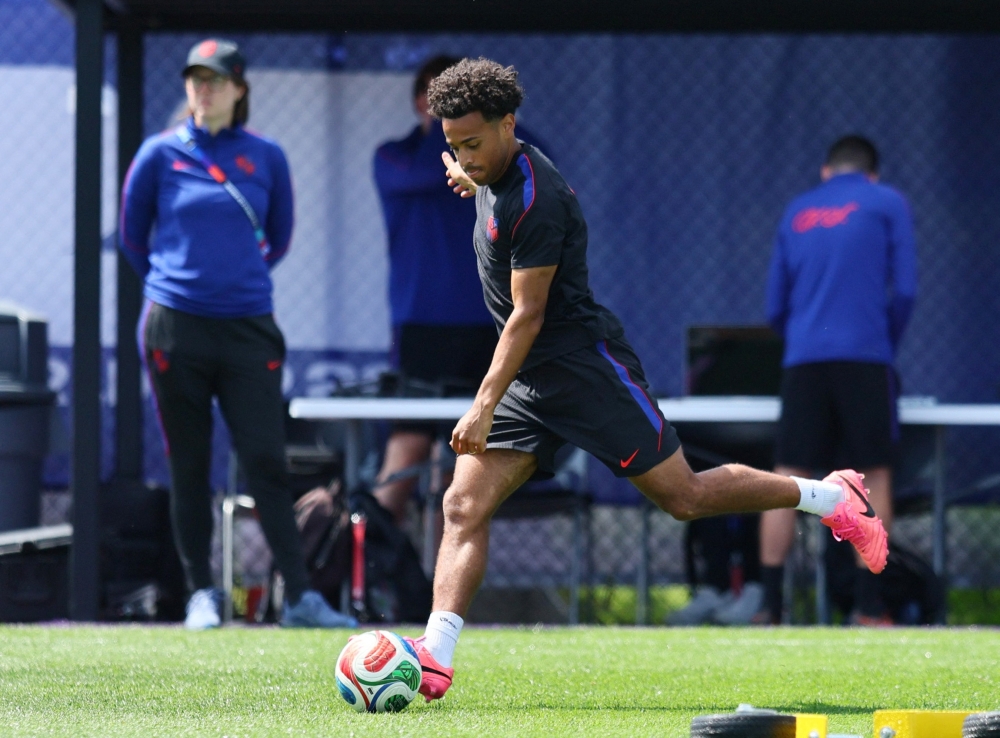 Adams of the U.S. during training. — Reuters