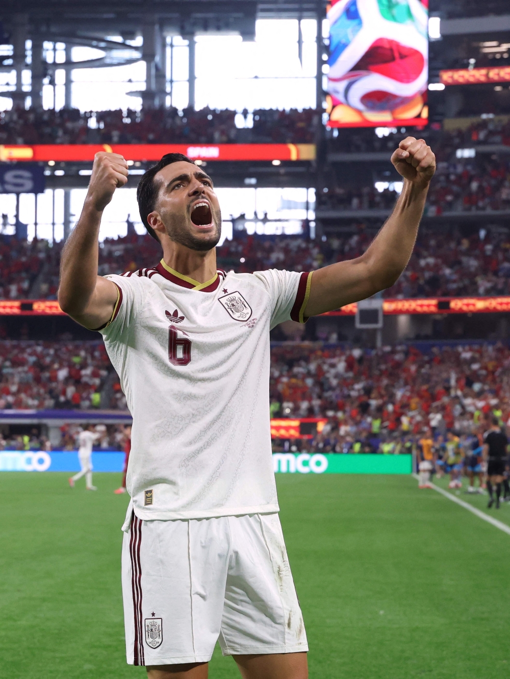 Spain's midfielder #06 Mikel Merino celebrates scoring his team's first goal  