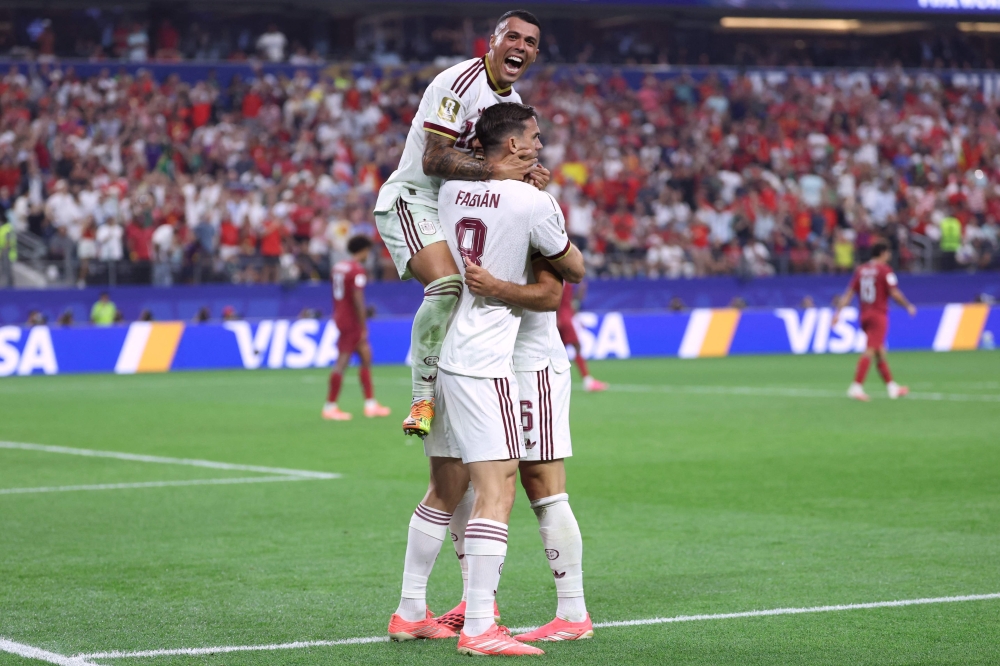 Spain's midfielder #06 Mikel Merino (R) celebrates scoring his team's first goal with teammates  
