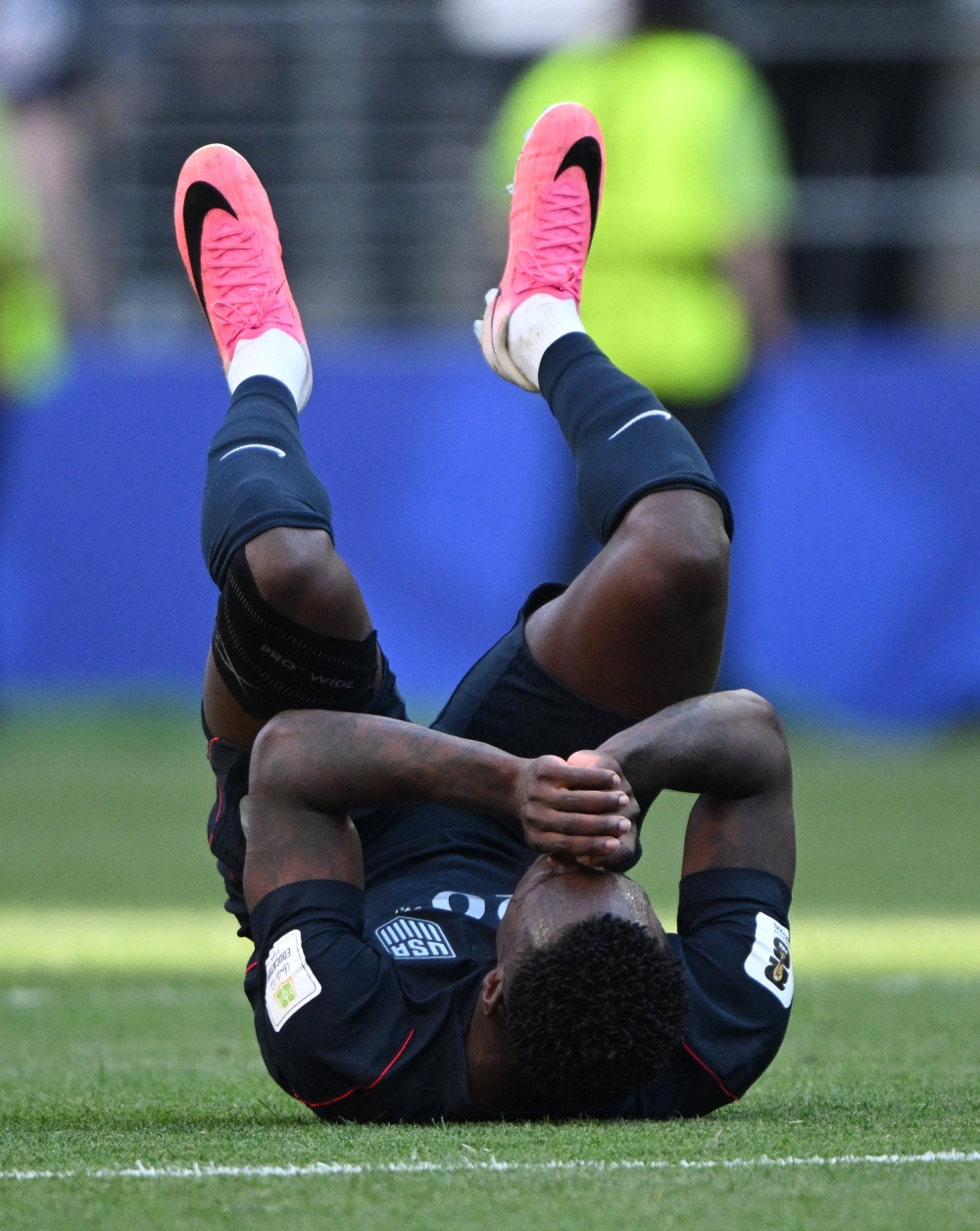  
Folarin Balogun of the U.S. looks dejected after Belgium's Hans Vanaken scores their third goal 