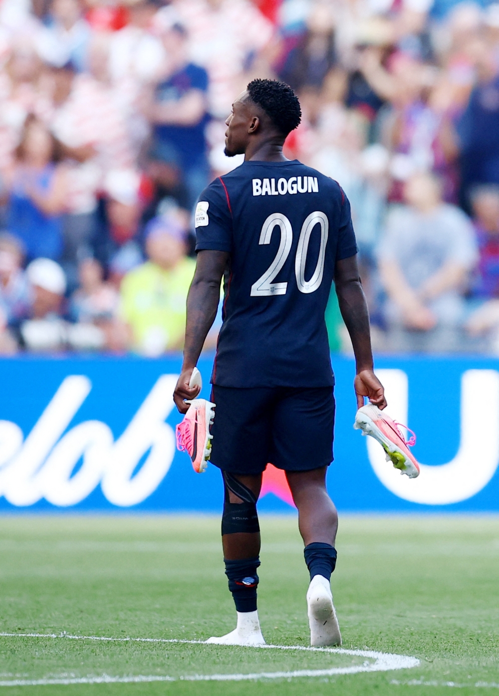  
Folarin Balogun of the U.S. looks dejected after the match as the United States are eliminated from the World Cup  