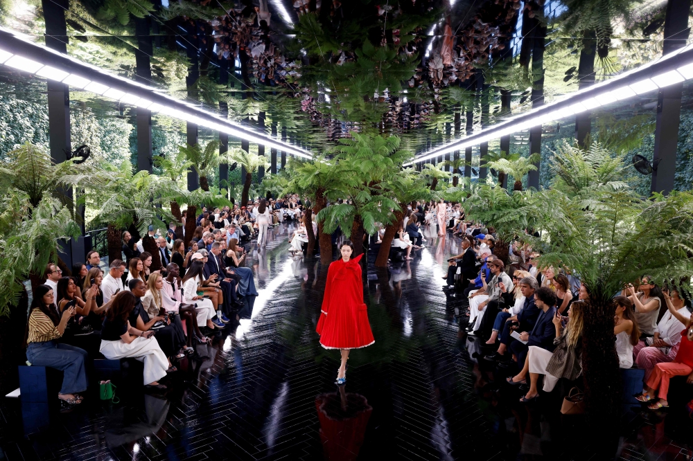 A model presents a creation for Christian Dior for the Women Haute Couture Fall/Winter 2026-2027 collection as part of the Paris Fashion Week, in Paris, on July 6, 2026. (Photo by Kenzo TRIBOUILLARD / AFP)
